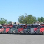 row-of-dump-trucks