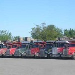 row-of-dump-trucks